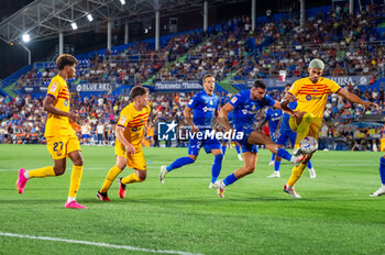 2023-08-13 - Ronald Araujo (Barcelona)
during the controversial play with the alleged penalty not whistled by the referee at the end of the LaLiga EA Sports football match between Getafe and Barcelona played at Coliseum Alfonso Perez Stadium on August 13, 2023 in Getafe, Spain - GETAFE VS BARCELONA - SPANISH LA LIGA - SOCCER