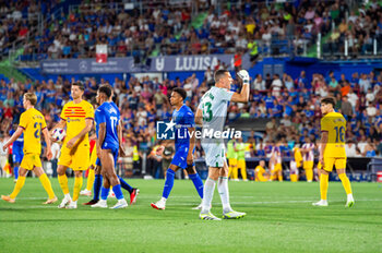 2023-08-13 - David Soria (Getafe) after the controversial play with the alleged penalty not whistled by the referee at the end of the LaLiga EA Sports football match between Getafe and Barcelona played at Coliseum Alfonso Perez Stadium on August 13, 2023 in Getafe, Spain - GETAFE VS BARCELONA - SPANISH LA LIGA - SOCCER