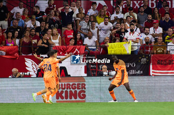 2023-08-11 - Mouctar Diakhaby of Valencia celebrates a goal 0-1 during the Spanish championship La Liga football match between Sevilla FC and Valencia CF on August 11, 2023 at Ramon Sanchez-Pizjuan stadium in Sevilla, Spain - FOOTBALL - SPANISH CHAMP - SEVILLA V VALENCIA - SPANISH LA LIGA - SOCCER