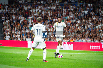 2023-09-02 - Rodrygo (Real Madrid) and Aurelien Tchouameni (Real Madrid) in action during the LaLiga EA Sports football match between Real Madrid vs Getafe played at Bernabeu stadium on September 02, 2023 in Madrid, Spain - REAL MADRID VS GETAFE - SPANISH LA LIGA - SOCCER