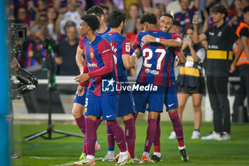2023-09-16 - Raphinha (FC Barcelona) celebrates after scoring his team's goal with team mates during a La Liga EA Sports match between FC Barcelona and Real Betis Balompie at Estadi Olimpic Lluis Companys, in Barcelona, ,Spain on September 16, 2023. (Photo / Felipe Mondino) - FC BARCELONA - REAL BETIS BALOMPIE - SPANISH LA LIGA - SOCCER