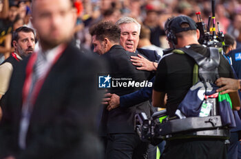 2023-09-24 - Carlo Ancelotti (Real Madrid) and Diego Pablo Simeone (Atletico Madrid) before the football match between Atletico Madrid vs Real Madrid, knows as the Derbi of Madrid, valid for the matchday 06 of LaLiga EA Sports played at Estadio Civitas Metropolitano on September 24, 2023 in Madrid, Spain - ATLETICO MADRID VS REAL MADRID - SPANISH LA LIGA - SOCCER