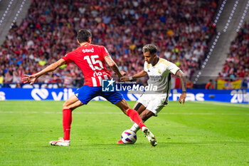 2023-09-24 - Rodrygo Silva de Goes (Real Madrid) in action against Stefan Savic (Atletico Madrid) during the football match between Atletico Madrid vs Real Madrid, knows as the Derbi of Madrid, valid for the matchday 06 of LaLiga EA Sports played at Estadio Civitas Metropolitano on September 24, 2023 in Madrid, Spain - ATLETICO MADRID VS REAL MADRID - SPANISH LA LIGA - SOCCER