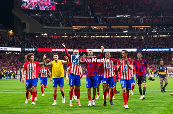 2023-09-24 - Atletico Madrid players (from L to R) Axel Witsel, Jose Gimenez, Antoine Griezmann, Jorge Resurreccion Merodio (Koke), Angel Correa, Stefan Savic, Ivo Grbic celebrate the victory at the end of the football match between Atletico Madrid vs Real Madrid, knows as the Derbi of Madrid, valid for the matchday 06 of LaLiga EA Sports played at Estadio Civitas Metropolitano on September 24, 2023 in Madrid, Spain - ATLETICO MADRID VS REAL MADRID - SPANISH LA LIGA - SOCCER