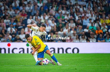 2023-09-27 - Lucas Vazquez (Real Madrid) in action against Maximo Perrone (Las Palmas) during the football match of Spanish championship La Liga EA Sports between Real Madrid vs Las Palmas played at Bernabeu stadium on September 27, 2023 in Madrid, Spain - REAL MADRID VS LAS PALMAS - SPANISH LA LIGA - SOCCER