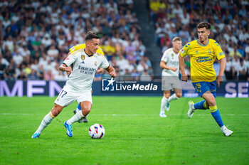 2023-09-27 - Lucas Vazquez (Real Madrid) in action against Maximo Perrone (Las Palmas) during the football match of Spanish championship La Liga EA Sports between Real Madrid vs Las Palmas played at Bernabeu stadium on September 27, 2023 in Madrid, Spain - REAL MADRID VS LAS PALMAS - SPANISH LA LIGA - SOCCER