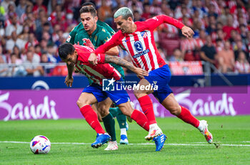 2023-10-01 - Antoine Griezmann (Atletico Madrid) and Angel Correa (Atletico Madrid) in action during the football match of Spanish championship La Liga EA Sports between Atletico Madrid vs Cadiz played at Metropolitano stadium on October 01, 2023 in Madrid, Spain - ATLETICO MADRID VS CADIZ - SPANISH LA LIGA - SOCCER