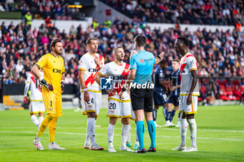 2023-10-29 - Stole Dimitrievski (Rayo Vallecano), Florian Lejeune (Rayo Vallecano), Ivan Balliu (Rayo Vallecano) and Abdul Mumin (Rayo Vallecano) protesting with the referee about a penalty kick during the football match of Spanish championship La Liga EA Sports between Rayo Vallecano vs Real Sociedad played at Vallecas stadium on October 29, 2023 in Madrid, Spain - RAYO VALLECANO VS REAL SOCIEDAD - SPANISH LA LIGA - SOCCER