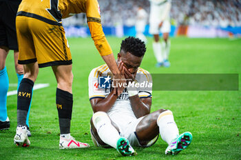 2023-11-05 - Vinicius Junior (Real Madrid) to the ground after being hit in the face by Abdul Mumin (Rayo Vallecano) during the football match of Spanish championship La Liga EA Sports between Real Madrid vs Rayo Vallecano played at Bernabeu stadium on November 05, 2023 in Madrid, Spain - REAL MADRID VS RAYO VALLECANO - SPANISH LA LIGA - SOCCER