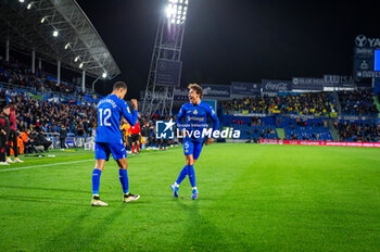2023-11-06 - Luis Milla (Getafe) (R) and Mason Greenwood (Getafe) (L) celebrate the goal that gives victory to their team during the football match of Spanish championship La Liga EA Sports between Getafe vs Cadiz played at Coliseum stadium on November 06, 2023 in Getafe, Spain - GETAFE VS CADIZ - SPANISH LA LIGA - SOCCER