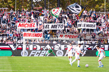 2023-11-11 - Rayo Vallecano fans display a banner in homage to Miguel Angel Sanchez Munoz, better known as Michel, historical figure of Rayo Vallecano and current coach of Girona, before the La Liga EA Sports 2022/23 football match between Rayo Vallecano vs Girona at Estadio de Vallecas in Madrid, Spain. - RAYO VALLECANO VS GIRONA - SPANISH LA LIGA - SOCCER