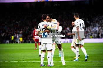2023-12-02 - Brahim Diaz and Jude Bellingham of Real Madrid seen celebrating a goal during the La Liga EA Sports 23/24 football match between Real Madrid vs Granada at Bernabeu stadium in Madrid, Spain. - REAL MADRID VS GRANADA - SPANISH LA LIGA - SOCCER