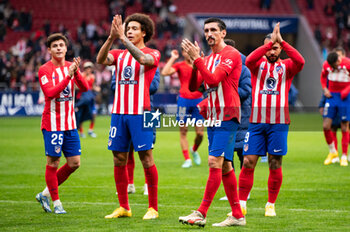 2023-12-10 - Stefan Savic of Atletico Madrid and Axel Witsel of Atletico Madrid seen greeting the fans at the end of the La Liga EA Sports 2023/24 football match between Atletico Madrid vs Almeria at Metropolitano stadium in Madrid, Spain. - ATLETICO MADRID VS ALMERIA - SPANISH LA LIGA - SOCCER