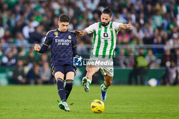 2023-12-09 - Federico Valverde of Real Madrid and Francisco 'Isco' Alarcon of Real Betis during the Spanish championship La Liga football match between Real Betis and Real Madrid on December 9, 2023 at Benito Villamarin stadium in Sevilla, Spain - FOOTBALL - SPANISH CHAMP - REAL BETIS V REAL MADRID - SPANISH LA LIGA - SOCCER