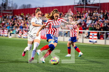 2023-03-12 - Estefania Bannini (Atletico Madrid) and Athenea Del Castillo (Real Madrid) in action during the women’s football match between
Atletico Madrid vs Real Madrid celebrated in Alcalá de Henares, Spain at Centro Deportivo Cívitas stadium on Sunday 12 March 2023 valid for match day 21 of the women's spanish first division “Liga F” football league - ATLETICO MADRID VS REAL MADRID - SPANISH PRIMERA DIVISION WOMEN - SOCCER