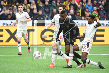2023-03-19 - February 18, 2023, Bern, Wankdorf, Super League: BSC Young Boys - FC Lugano, #18 Jean-Pierre Nsame (Young Boys) is fouled by #7 Liam Millar (Basel) and #33 Riccardo Calafiori (Basel) in the penalty area. - SUPER LEAGUE: BSC YOUNG BOYS - FC LUGANO - SWISS SUPER LEAGUE - SOCCER