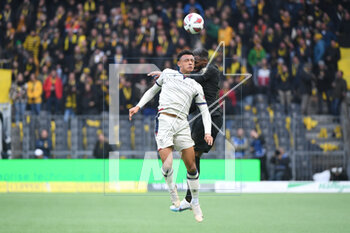 2023-03-19 - February 19, 2023, Bern, Wankdorf, Super League: BSC Young Boys - FC Lugano, #21 Ulisses Garcia (Young Boys) against #27 Dan Ndoye (Basel). - SUPER LEAGUE: BSC YOUNG BOYS - FC LUGANO - SWISS SUPER LEAGUE - SOCCER
