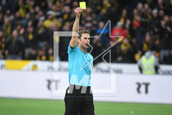 2023-03-19 - March 19, 2023, Bern, Wankdorf, Super League: BSC Young Boys - FC Lugano, referee Lukas Fahndrich shows the yellow card. - SUPER LEAGUE: BSC YOUNG BOYS - FC LUGANO - SWISS SUPER LEAGUE - SOCCER