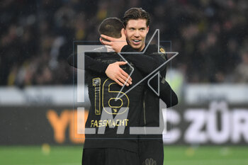 2023-03-19 - March 19, 2023, Bern, Wankdorf, Super League: BSC Young Boys - FC Lugano, #16 Christian Fassnacht (Young Boys) congratulates #11 Cedric Itten (Young Boys) on his hat trick. - SUPER LEAGUE: BSC YOUNG BOYS - FC LUGANO - SWISS SUPER LEAGUE - SOCCER