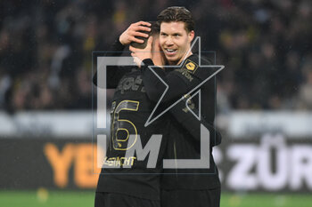 2023-03-19 - March 19, 2023, Bern, Wankdorf, Super League: BSC Young Boys - FC Lugano, #16 Christian Fassnacht (Young Boys) congratulates #11 Cedric Itten (Young Boys) on his hat trick. - SUPER LEAGUE: BSC YOUNG BOYS - FC LUGANO - SWISS SUPER LEAGUE - SOCCER