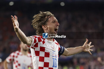 2023-06-14 - Luka Modric of Croatia celebrates his goal during the UEFA Nations League, Semi-finals football match between Netherlands and Croatia on June 14, 2023 at Stadion Feijenoord 'De Kuip' in Rotterdam, Netherlands - FOOTBALL - UEFA NATIONS LEAGUE 2023 - 1/2 - NETHERLANDS V CROATIA - UEFA NATIONS LEAGUE - SOCCER