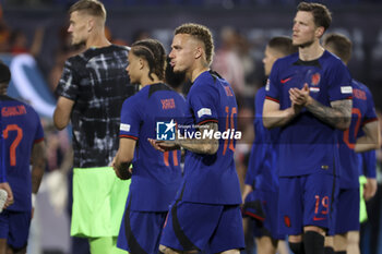 2023-06-14 - Noa Lang of Netherlands salutes the fans following the UEFA Nations League, Semi-finals football match between Netherlands and Croatia on June 14, 2023 at Stadion Feijenoord 'De Kuip' in Rotterdam, Netherlands - FOOTBALL - UEFA NATIONS LEAGUE 2023 - 1/2 - NETHERLANDS V CROATIA - UEFA NATIONS LEAGUE - SOCCER