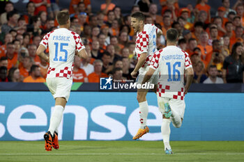 2023-06-14 - Andrej Kramaric of Croatia celebrates his goal during the UEFA Nations League, Semi-finals football match between Netherlands and Croatia on June 14, 2023 at Stadion Feijenoord 'De Kuip' in Rotterdam, Netherlands - FOOTBALL - UEFA NATIONS LEAGUE 2023 - 1/2 - NETHERLANDS V CROATIA - UEFA NATIONS LEAGUE - SOCCER