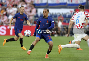 2023-06-14 - Xavi Simons of Netherlands during the UEFA Nations League, Semi-finals football match between Netherlands and Croatia on June 14, 2023 at Stadion Feijenoord 'De Kuip' in Rotterdam, Netherlands - FOOTBALL - UEFA NATIONS LEAGUE 2023 - 1/2 - NETHERLANDS V CROATIA - UEFA NATIONS LEAGUE - SOCCER