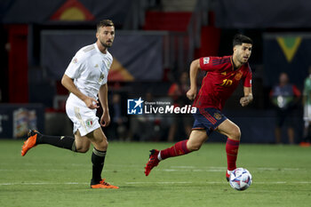2023-06-15 - Marco Asensio of Spain, left Bryan Cristante of Italy during the UEFA Nations League Semi-final football match between Spain and Italy on June 15, 2023 at De Grolsch Veste, FC Twente stadium in Enschede, Netherlands - FOOTBALL - UEFA NATIONS LEAGUE 2023 - 1/2 - SPAIN V ITALY - UEFA NATIONS LEAGUE - SOCCER