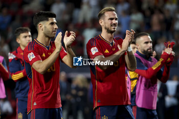 2023-06-15 - Marco Asensio, Fabian Ruiz of Spain celebrate the victory following the UEFA Nations League Semi-final football match between Spain and Italy on June 15, 2023 at De Grolsch Veste, FC Twente stadium in Enschede, Netherlands - FOOTBALL - UEFA NATIONS LEAGUE 2023 - 1/2 - SPAIN V ITALY - UEFA NATIONS LEAGUE - SOCCER
