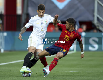 2023-06-15 - Giovanni Di Lorenzo of Italy, Yeremy Pino of Spain during the UEFA Nations League Semi-final football match between Spain and Italy on June 15, 2023 at De Grolsch Veste, FC Twente stadium in Enschede, Netherlands - FOOTBALL - UEFA NATIONS LEAGUE 2023 - 1/2 - SPAIN V ITALY - UEFA NATIONS LEAGUE - SOCCER