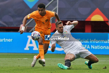 2023-06-18 - Cody Gakpo (Netherlands) and Rafael Toloi (Italy) - THIRD-PLACE MATCH - NETHERLANDS VS ITALY - UEFA NATIONS LEAGUE - SOCCER