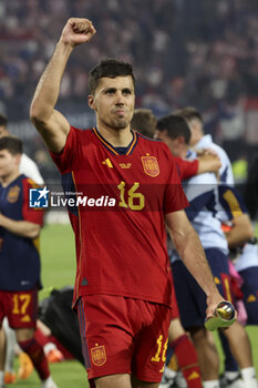 2023-06-18 - Best Player of the Match Rodri of Spain celebrates the victory following the UEFA Nations League 2023 Final football match between Croatia and Spain on June 18, 2023 at Stadion Feijenoord 'De Kuip' in Rotterdam, Netherlands - FOOTBALL - UEFA NATIONS LEAGUE 2023 - FINAL - CROATIA V SPAIN - UEFA NATIONS LEAGUE - SOCCER