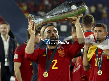 2023-06-18 - Dani Carvajal of Spain celebrates the victory with the trophy following the UEFA Nations League 2023 Final football match between Croatia and Spain on June 18, 2023 at Stadion Feijenoord 'De Kuip' in Rotterdam, Netherlands - FOOTBALL - UEFA NATIONS LEAGUE 2023 - FINAL - CROATIA V SPAIN - UEFA NATIONS LEAGUE - SOCCER