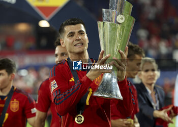 2023-06-18 - Alvaro Morata of Spain celebrates the victory with the trophy following the UEFA Nations League 2023 Final football match between Croatia and Spain on June 18, 2023 at Stadion Feijenoord 'De Kuip' in Rotterdam, Netherlands - FOOTBALL - UEFA NATIONS LEAGUE 2023 - FINAL - CROATIA V SPAIN - UEFA NATIONS LEAGUE - SOCCER