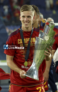 2023-06-18 - Dani Olmo of Spain celebrates the victory with the trophy following the UEFA Nations League 2023 Final football match between Croatia and Spain on June 18, 2023 at Stadion Feijenoord 'De Kuip' in Rotterdam, Netherlands - FOOTBALL - UEFA NATIONS LEAGUE 2023 - FINAL - CROATIA V SPAIN - UEFA NATIONS LEAGUE - SOCCER