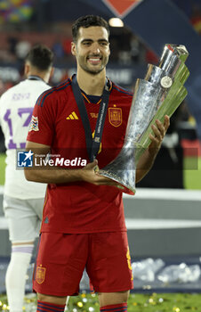 2023-06-18 - Mikel Merino of Spain celebrates the victory with the trophy following the UEFA Nations League 2023 Final football match between Croatia and Spain on June 18, 2023 at Stadion Feijenoord 'De Kuip' in Rotterdam, Netherlands - FOOTBALL - UEFA NATIONS LEAGUE 2023 - FINAL - CROATIA V SPAIN - UEFA NATIONS LEAGUE - SOCCER