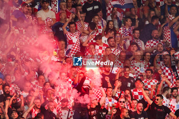 2023-06-18 - Flares from Croatia fans during the UEFA Nations League 2023, Final football match between Croatia and Spain on June 18, 2023 at Stadion Feijenoord 'De Kuip' in Rotterdam, Netherlands - FOOTBALL - UEFA NATIONS LEAGUE 2023 - FINAL - CROATIA V SPAIN - UEFA NATIONS LEAGUE - SOCCER