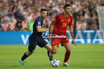 2023-06-18 - Rodri of Spain, left Mateo Kovacic of Croatia during the UEFA Nations League 2023, Final football match between Croatia and Spain on June 18, 2023 at Stadion Feijenoord 'De Kuip' in Rotterdam, Netherlands - FOOTBALL - UEFA NATIONS LEAGUE 2023 - FINAL - CROATIA V SPAIN - UEFA NATIONS LEAGUE - SOCCER