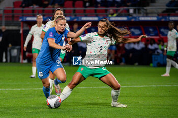 2023-08-02 - Eugenie Le Sommer of France and Catarina Amado of Portugal fight for the ball during the 2023 UEFA Women’s Nations League, League A - Group A2 football match between France and Portugal on 22 September 2023 at Stade du Hainaut - Valenciennes, France - FOOTBALL - WOMEN'S NATIONS LEAGUE 2023 - FRANCE V PORTUGAL - UEFA NATIONS LEAGUE - SOCCER