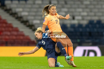 2023-10-31 - Sophie Howard of Scotland slides in on Lieke Martens of Netherlands during the UEFA Women's Nations League, League A Group A1, football match between Scotland and Netherlands on 31 October 2023 at Hampden Park in Glasgow, Scotland - FOOTBALL - WOMEN'S NATIONS LEAGUE - SCOTLAND V NETHERLANDS - UEFA NATIONS LEAGUE - SOCCER
