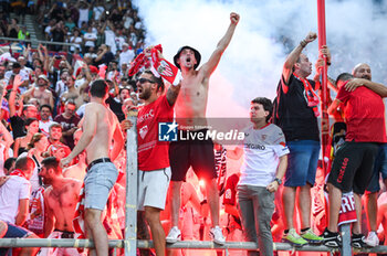 2023-08-16 - Sevilla FC fans during the UEFA Super Cup 
match between Manchester City and Sevilla FC at Georgios Karaiskakis
 Stadium on August 16, 2023, in Piraeus, Greece. - UEFA SUPER CUP MANCHESTER CITY VS SEVILLA FC - UEFA SUPER CUP - SOCCER