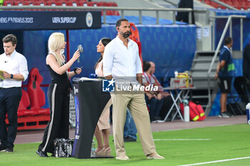 2023-08-16 - Tv presenter and ex player of Manchester United RIO FERDINAND during the UEFA Super Cup match between Manchester City and Sevilla FC at Georgios Karaiskakis Stadium on August 16, 2023, in Piraeus, Greece. - UEFA SUPER CUP MANCHESTER CITY VS SEVILLA FC - UEFA SUPER CUP - SOCCER