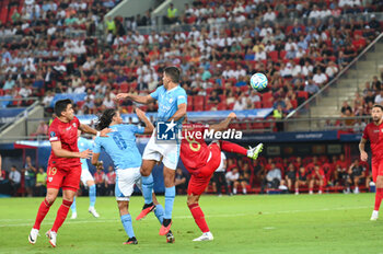 2023-08-16 - 16 RODRIGO of Manchester City competing with 8 JOAN JORDAN of Sevilla FC during the UEFA Super Cup match between Manchester City and Sevilla FC at Georgios Karaiskakis Stadium on August 16, 2023, in Piraeus, Greece. - UEFA SUPER CUP MANCHESTER CITY VS SEVILLA FC - UEFA SUPER CUP - SOCCER