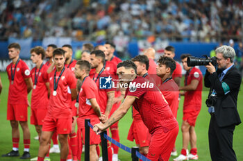 16/08/2023 - Players of Sevilla FC disappointed after losing the UEFA Super Cup match between Manchester City and Sevilla FC at Georgios Karaiskakis Stadium on August 16, 2023, in Piraeus, Greece. - UEFA SUPER CUP MANCHESTER CITY VS SEVILLA FC - SUPERCOPPA EUROPEA - CALCIO