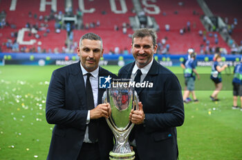16/08/2023 - Manchester City chairman KHALDOON AL MUBARAK and FERRAN SORIANO with the trophy after winning the UEFA Super Cup match between Manchester City and Sevilla FC at Georgios Karaiskakis Stadium on August 16, 2023, in Piraeus, Greece. - UEFA SUPER CUP MANCHESTER CITY VS SEVILLA FC - SUPERCOPPA EUROPEA - CALCIO