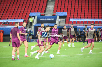 2023-08-15 - Sevilla FC during the team training session ahead of the UEFA Super Cup Final 2023 at Georgios Karaiskakis Stadium on August 15, 2023, in Piraeus, Greece. - SEVILLA FC TRAINING SESSION BEFORE THE UEFA SUPER CUP 2023 GAME - UEFA SUPER CUP - SOCCER