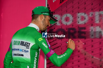 2023-05-19 - Green Project-Bardiani CFS-Faizane on the signature podium - Stage 13 - Giro d'Italia 2023 - 13 STAGE - BORGOFRANCO D'IVREA - CRANS MONTANA - GIRO D'ITALIA - CYCLING