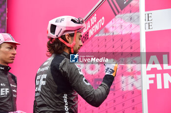 2023-05-19 - EF Education-Esaypoint on the signature podium - Stage 13 - Giro d'Italia 2023 - 13 STAGE - BORGOFRANCO D'IVREA - CRANS MONTANA - GIRO D'ITALIA - CYCLING