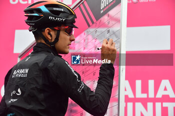 2023-05-19 - Bahrain Victorius on the signature podium - Stage 13 - Giro d'Italia 2023 - 13 STAGE - BORGOFRANCO D'IVREA - CRANS MONTANA - GIRO D'ITALIA - CYCLING